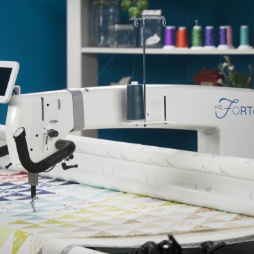 Handi Quilter Forte has many convenient, high-tech features making it one of the best longarm quilting machines for creative quilting.