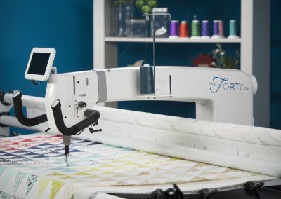 Handi Quilter Forte has many convenient, high-tech features making it one of the best longarm quilting machines for creative quilting.